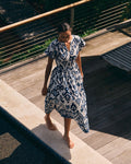 The lifestyle view of the Southern Tide Ana Dolman Sleeve Maxi Dress by Southern Tide - Star White