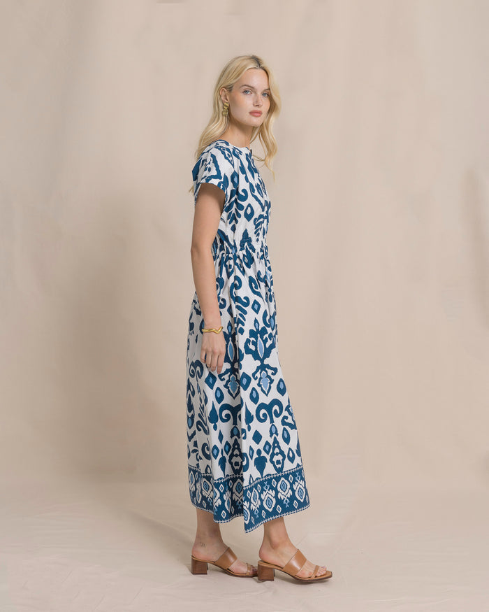 The side view of the Southern Tide Ana Dolman Sleeve Maxi Dress by Southern Tide - Star White