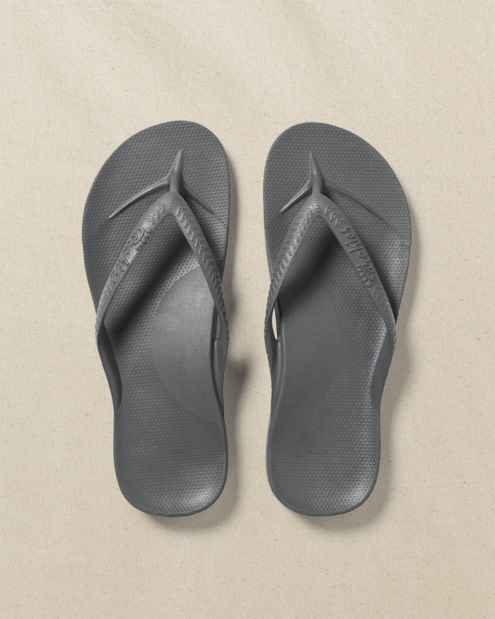 The top view of the Southern Tide Archie's Charcoal Arch Support Flip Flop by Southern Tide - Charcoal