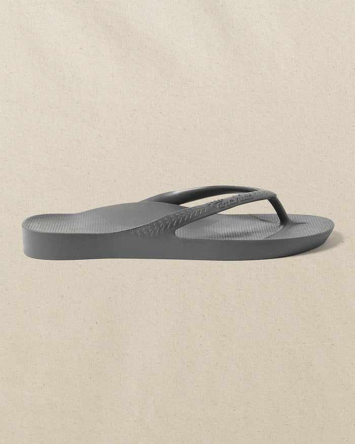 The right side view of the Southern Tide Archie's Charcoal Arch Support Flip Flop by Southern Tide - Charcoal