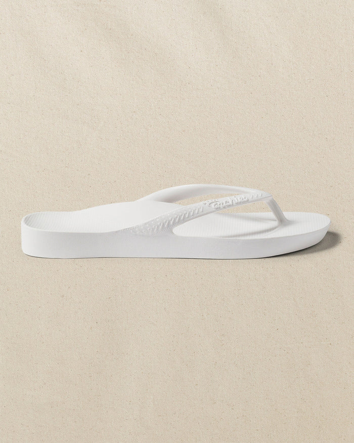 The right side view of the Southern Tide Archies Classic White Arch Support Flip Flop by Southern Tide - Classic White