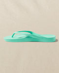 The left side view of the Southern Tide Archies Mint Arch Support Flip Flop by Southern Tide - Mint