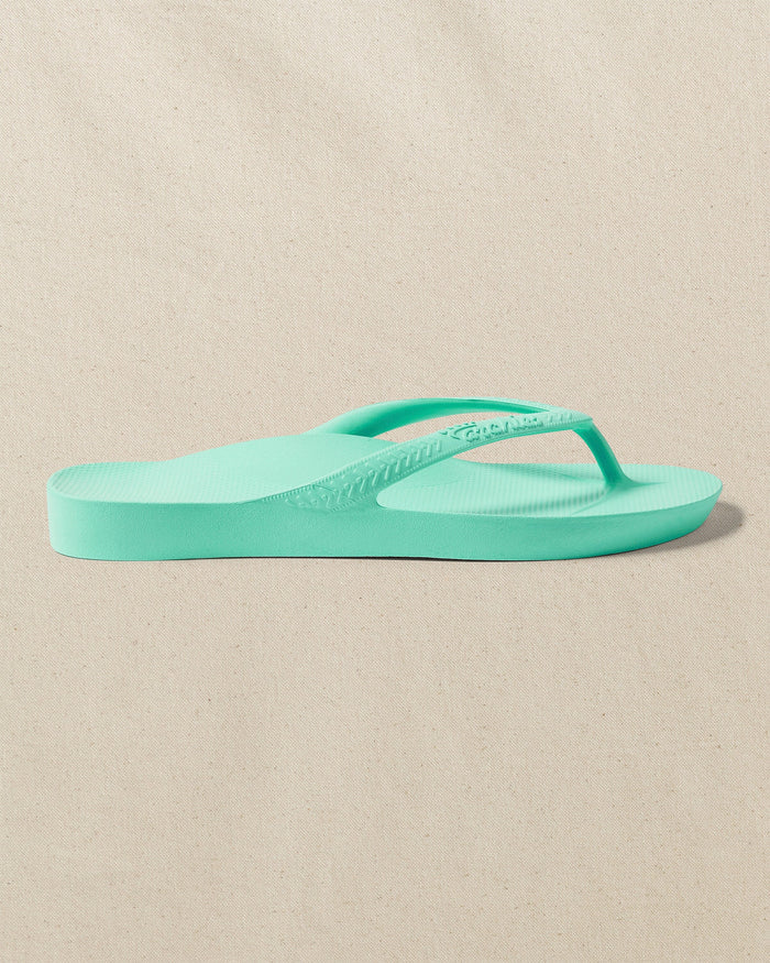 The right side view of the Southern Tide Archies Mint Arch Support Flip Flop by Southern Tide - Mint