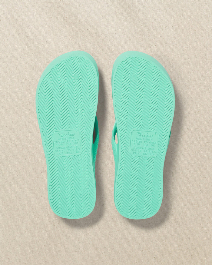 The bottom view of the Southern Tide Archies Mint Arch Support Flip Flop by Southern Tide - Mint