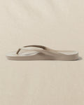 The left side view of the Southern Tide Archie's Taupe Arch Support Flip Flop by Southern Tide - Taupe
