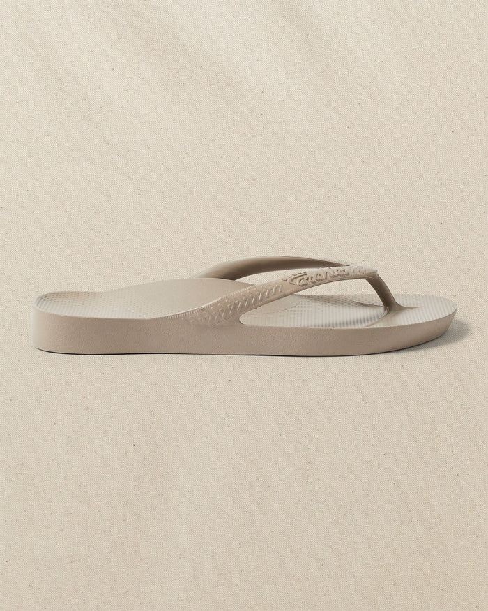 The right side view of the Southern Tide Archie's Taupe Arch Support Flip Flop by Southern Tide - Taupe