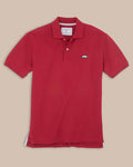 The front view of the Arkansas Razorbacks Pique Polo Shirt by Southern Tide - Crimson
