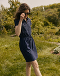 The lifestyle view of the Southern Tide Bailee Short Sleeve Performance Dress by Southern Tide - Dress Blue