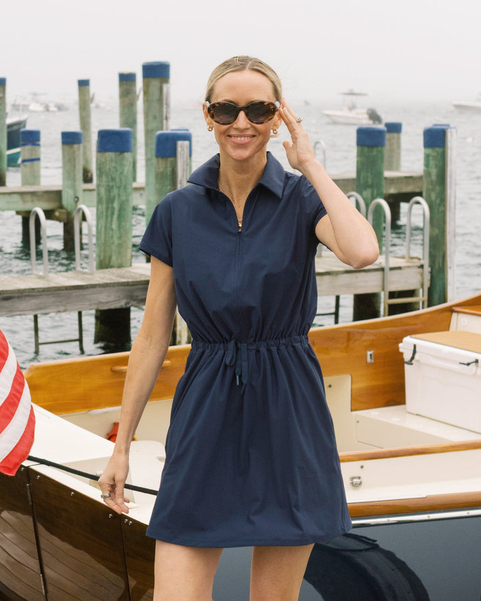 The lifestyle view of the Southern Tide Bailee Short Sleeve Performance Dress by Southern Tide - Dress Blue