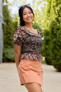 Beautifully Done Black Floral Smocked Peplum Blouse