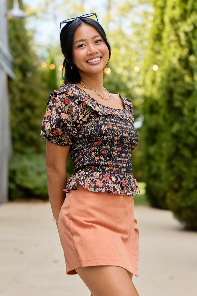 Beautifully Done Black Floral Smocked Peplum Blouse