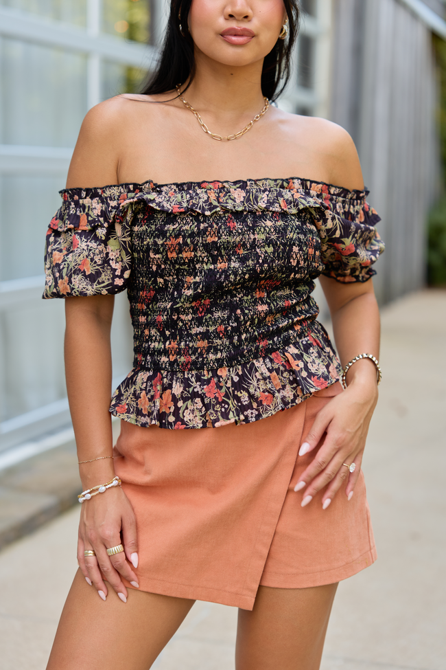Beautifully Done Black Floral Smocked Peplum Blouse