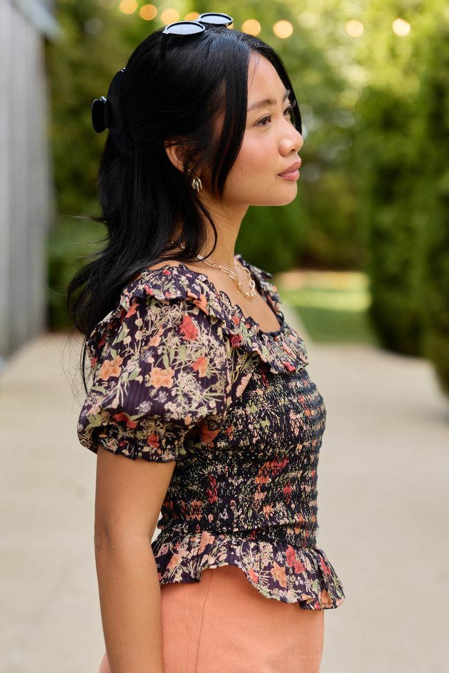 Beautifully Done Black Floral Smocked Peplum Blouse