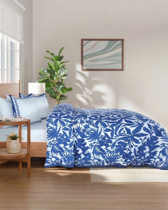 The side view of the Southern Tide Blossom Isle Comforter Set by Southern Tide - Navy