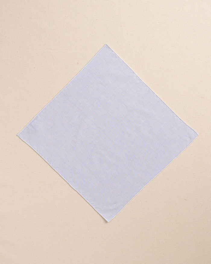 The front view of the High Cotton Blue Chambray Pocket Square at Southern Tide - Blue