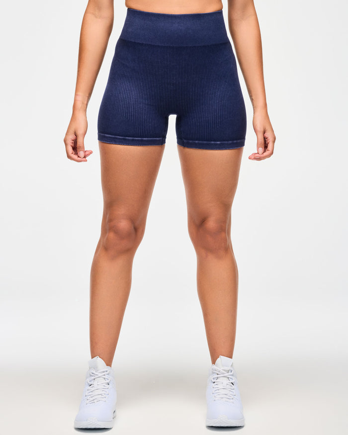Front view of denim corduroy blue biker shorts.