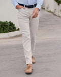 The lifestyle view of the Southern Tide Bluewater Five Pocket Pant by Southern Tide - Stone