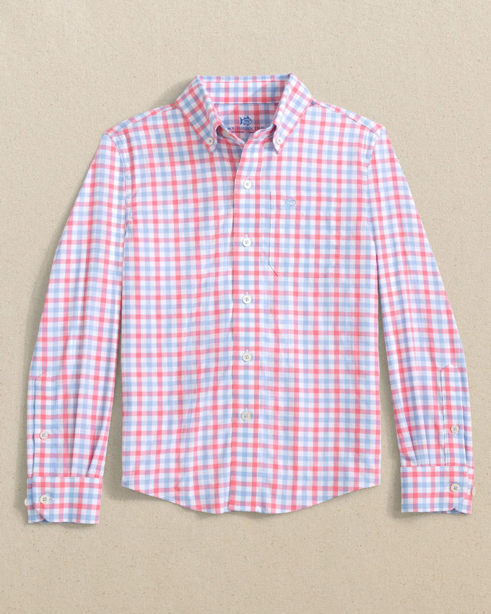 The front view of the Southern Tide Boys Albemarle Plaid Intercoastal Sport Shirt by Southern Tide - Sunkist Coral