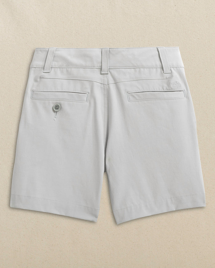 The back view of the Southern Tide Boys Bogey Short by Southern Tide - Seagull Grey