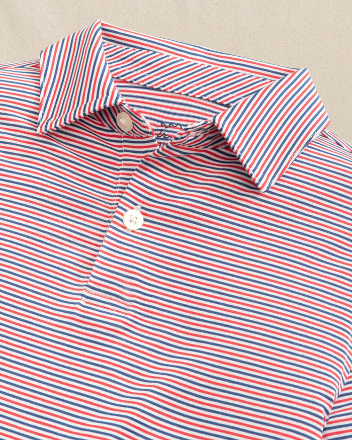 The detail view of the Southern Tide Boys Driver Micro-Stripe Performance Polo by Southern Tide - Channel Marker Red