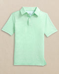 The front view of the Southern Tide Boys Driver Pineapple Parade Printed Performance Polo by Southern Tide - Green Ash