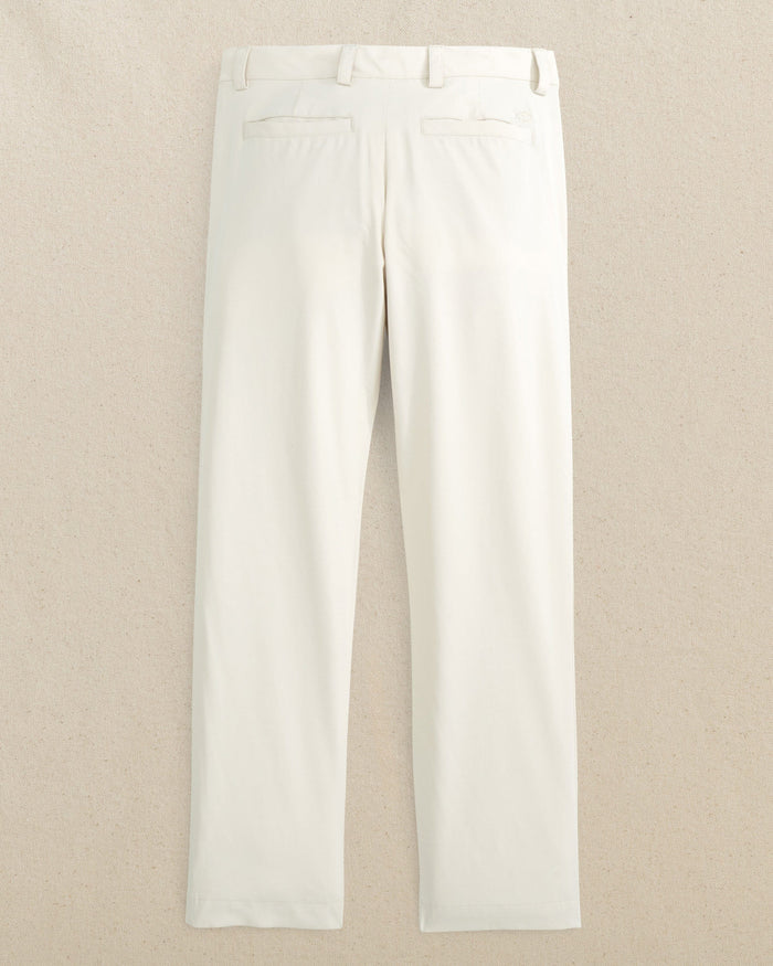 The back view of the Youth Leadhead Performance Pant by Southern Tide - Stone