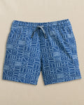 The front view of the Southern Tide Boys Nautical Flags Swim Trunk by Southern Tide - Nautical Blue
