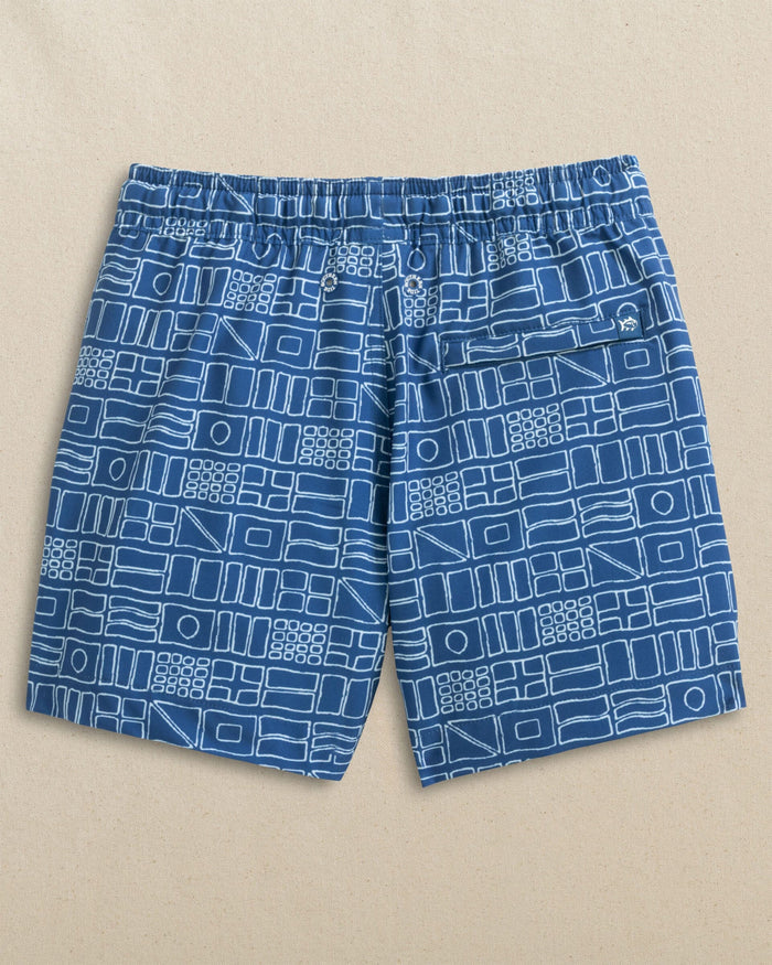The back view of the Southern Tide Boys Nautical Flags Swim Trunk by Southern Tide - Nautical Blue