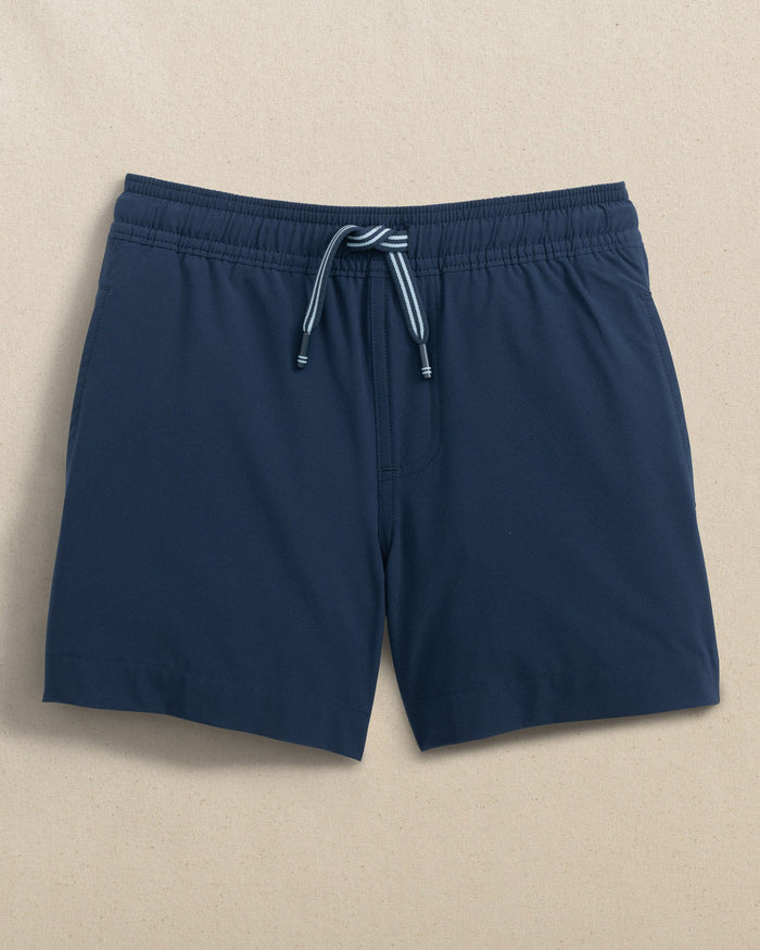 The front view of the Southern Tide Boys Solid Maritime Swim Trunk by Southern Tide - Dress Blue