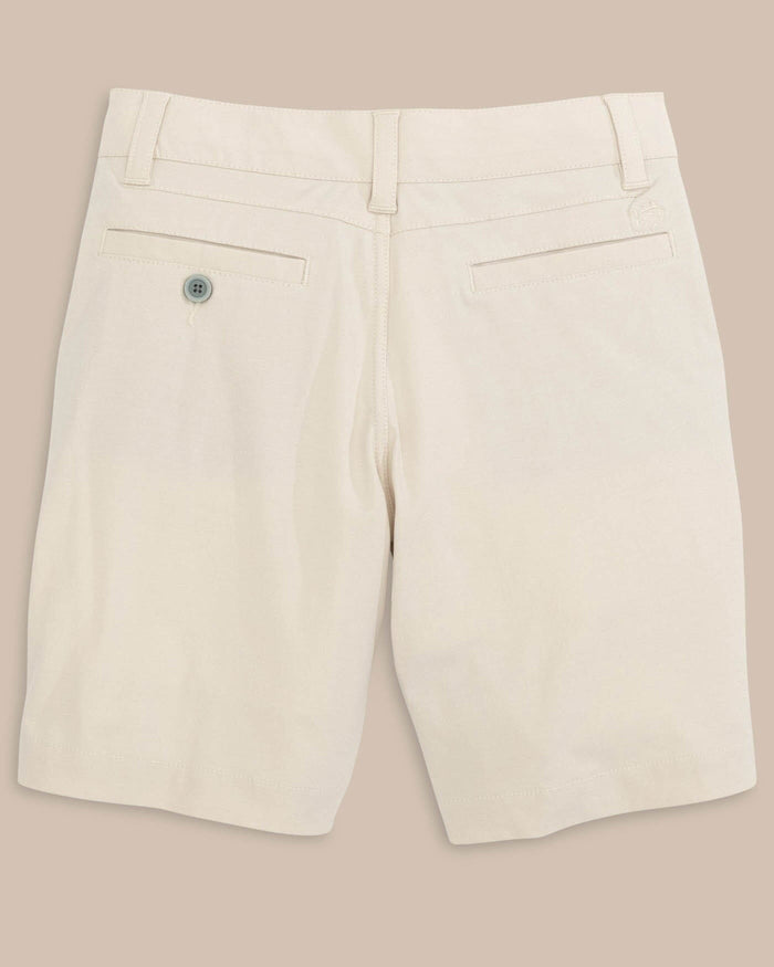 The back view of the Kid's T3 Gulf Short by Southern Tide - Stone