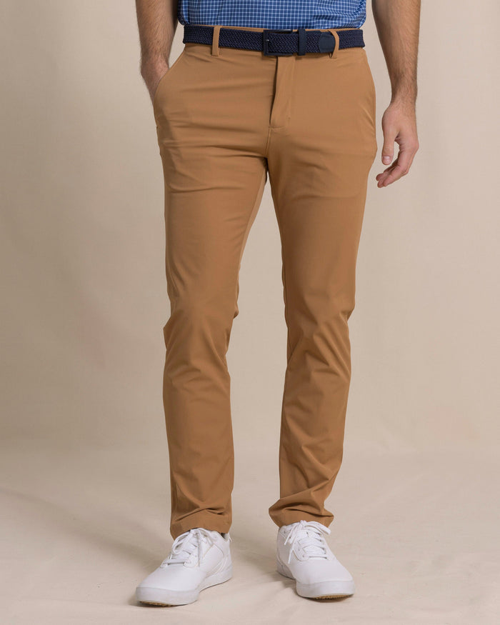 The front view of the Southern Tide brrr°®-die Performance Pant by Southern Tide - Hazelnut Khaki