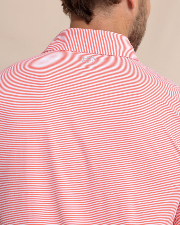 The detail view of the Southern Tide brrr°®-eeze Meadowbrook Stripe Polo by Southern Tide - Sunkist Coral