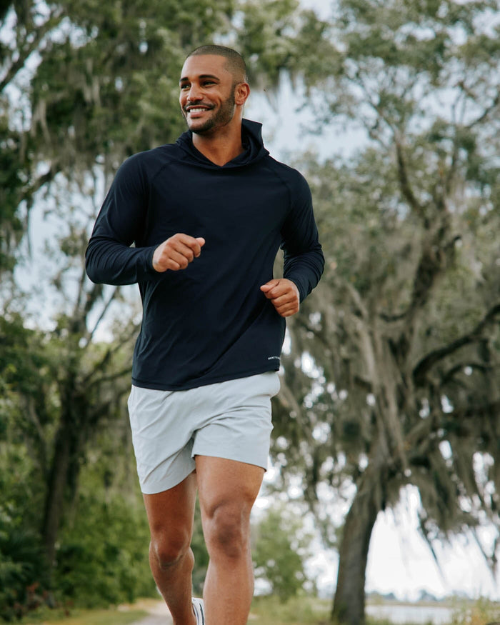The front view of the Southern Tide brrr-illiant Performance Hoodie by Southern Tide - Caviar Black