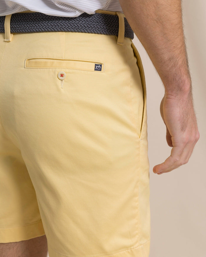The detail view of the Southern Tide Channel Marker 7" Stretch Chino Short by Southern Tide - Pineapple