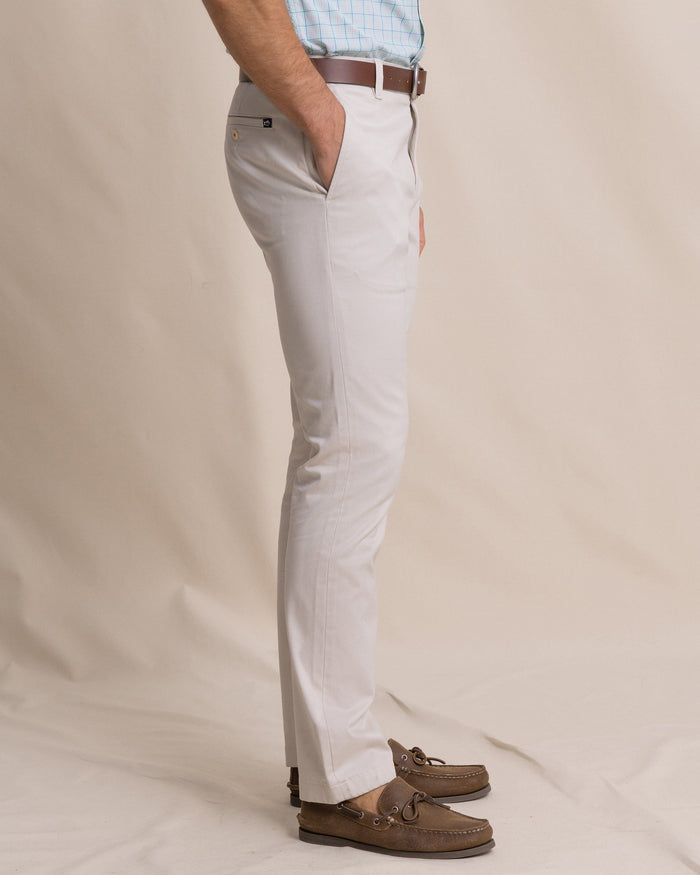 The side view of the Southern Tide Channel Marker Stretch Chino Pant by Southern Tide - Stone