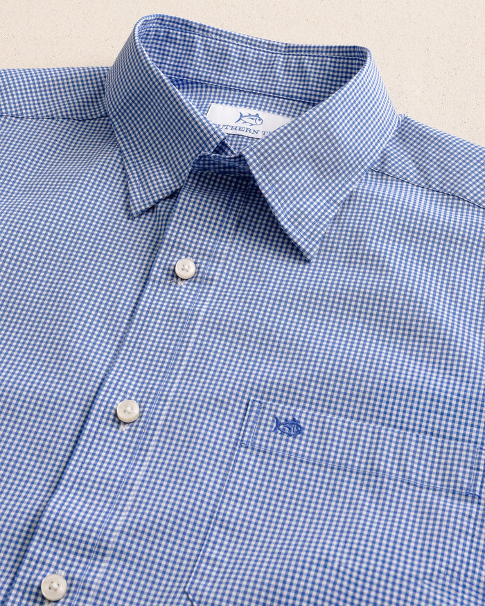 The detail view of the Southern Tide Charleston Parkwood Micro-gingham Embroidered Sport Shirt by Southern Tide - Cobalt Blue