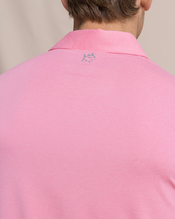 The detail view of the Southern Tide Coastal Breeze® Heather Performance Polo by Southern Tide - Heather Sea Pink