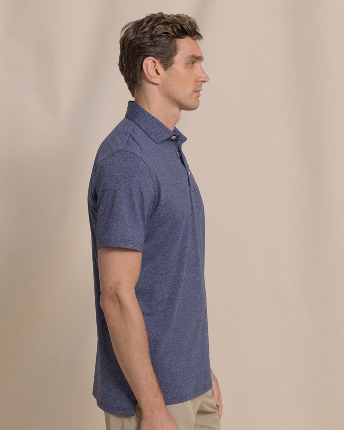 The side view of the Southern Tide Coastal Breeze® Heather Performance Polo by Southern Tide - Heather Nautical Navy