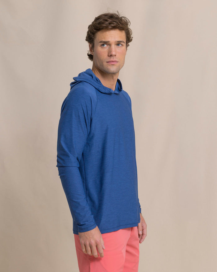 The side view of the Southern Tide Coastal Breeze® Performance Hoodie by Southern Tide - Nautical Blue