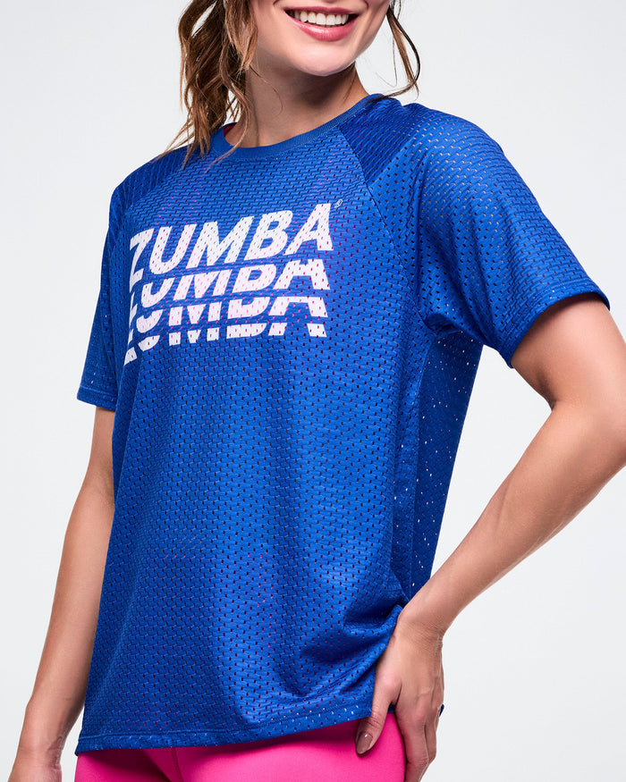 Close-up view showing a female model wearing a blue Zumba mesh top.