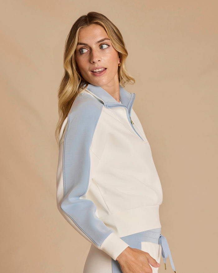 The side view of the Southern Tide Colorblock Lounge Quarter Zip by Southern Tide - Star White