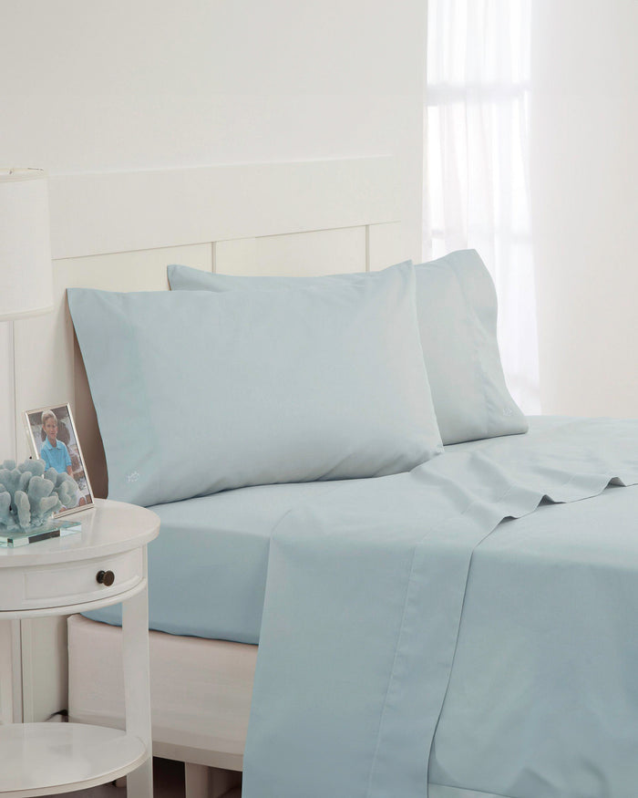 The angle front view of the Southern Tide Cotton Twill Sheet Set by Southern Tide - Sunlight Blue