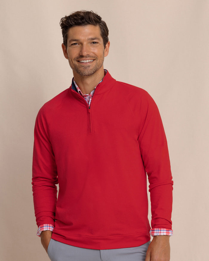 The front view of the Southern Tide Cruiser Heather Quarter Zip Pullover by Southern Tide - Heather Crab Red