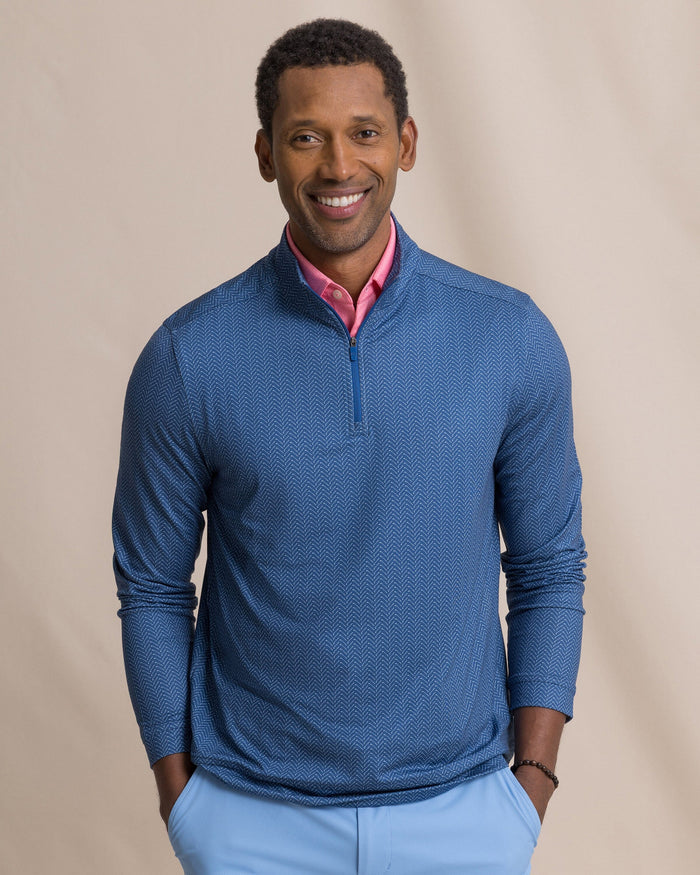 The front view of the Southern Tide Cruiser Raise The Par Printed Quarter Zip by Southern Tide - Nautical Blue