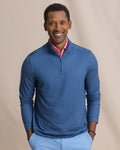 The front view of the Southern Tide Cruiser Raise The Par Printed Quarter Zip by Southern Tide - Nautical Blue