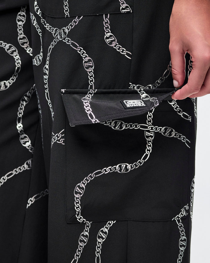 Close-up view of cargo pocket and the silver chain pattern details.