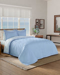 The side view of the Southern Tide Darien Quilt by Southern Tide - Blue