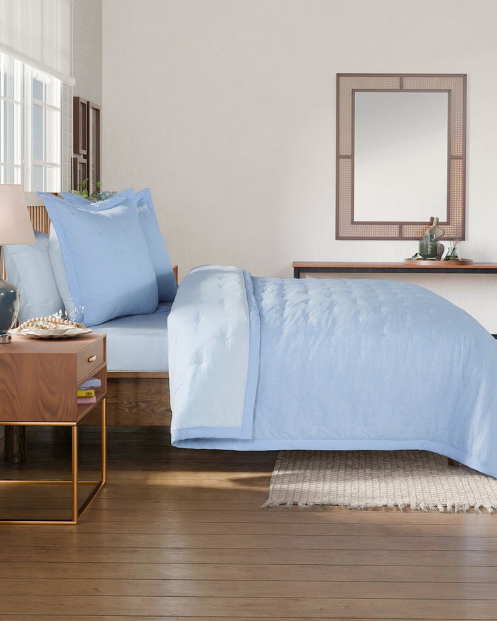 The side view of the Southern Tide Darien Quilt by Southern Tide - Blue
