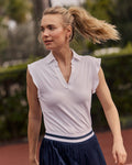 The lifestyle view of the Southern Tide Dayna Active Ruffle Polo Tank by Southern Tide - Classic White