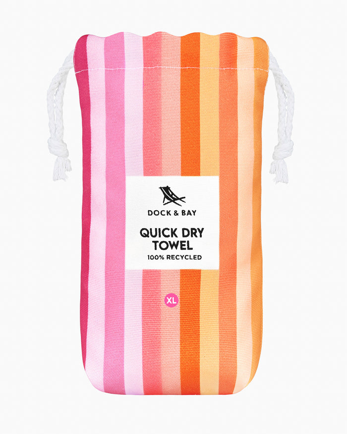 The front view of the Southern Tide Dock & Bay Quick Dry Beach Towel by Southern Tide - Miami Sorbet Pink